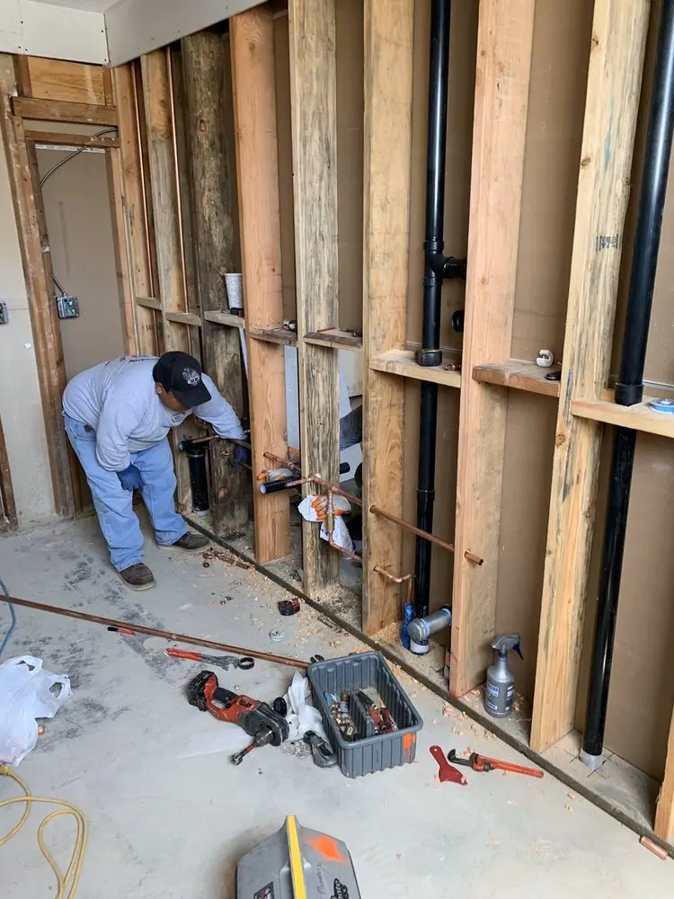 Commercial rough-in plumbing for Water Heater Replacement in Highland Terrace